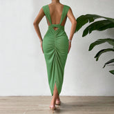 Robe de soirée slim dos nu avec sac à bandoulière